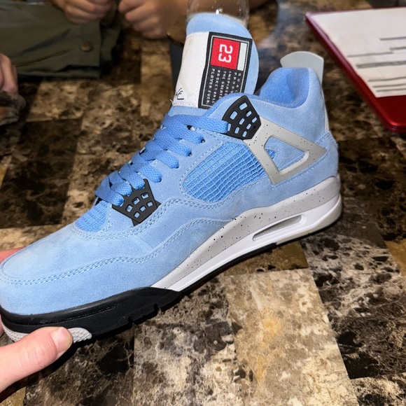 air jordan 4 retro university blue price